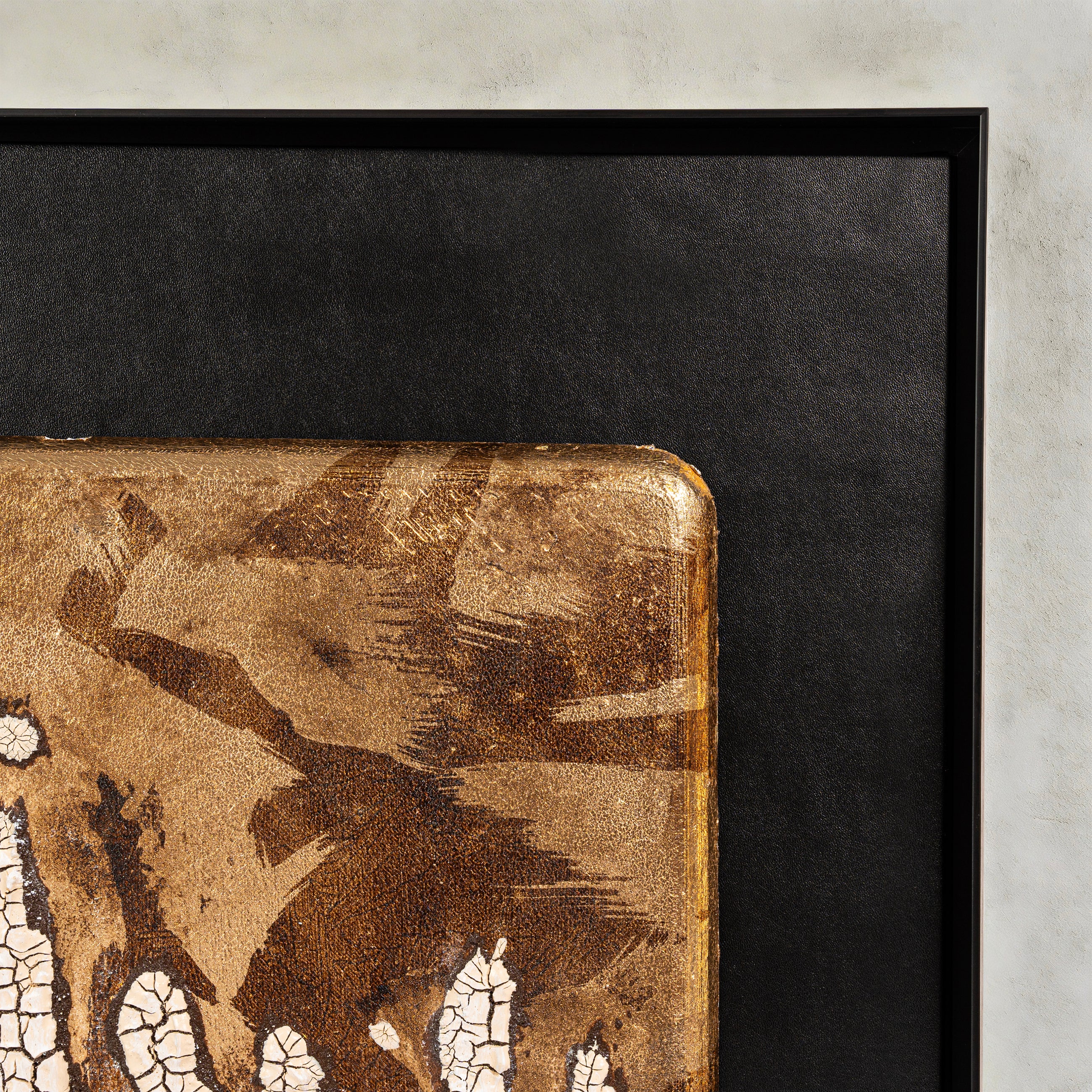 Corner detail of Efflorescence — Patinated Foil · Aura Frame, showing where heat-oxidized fired foil and flush metallic plates meet the cracked mineral ground — sixteen stages of high-temperature firing producing natural tonal variation across the metal element texture.