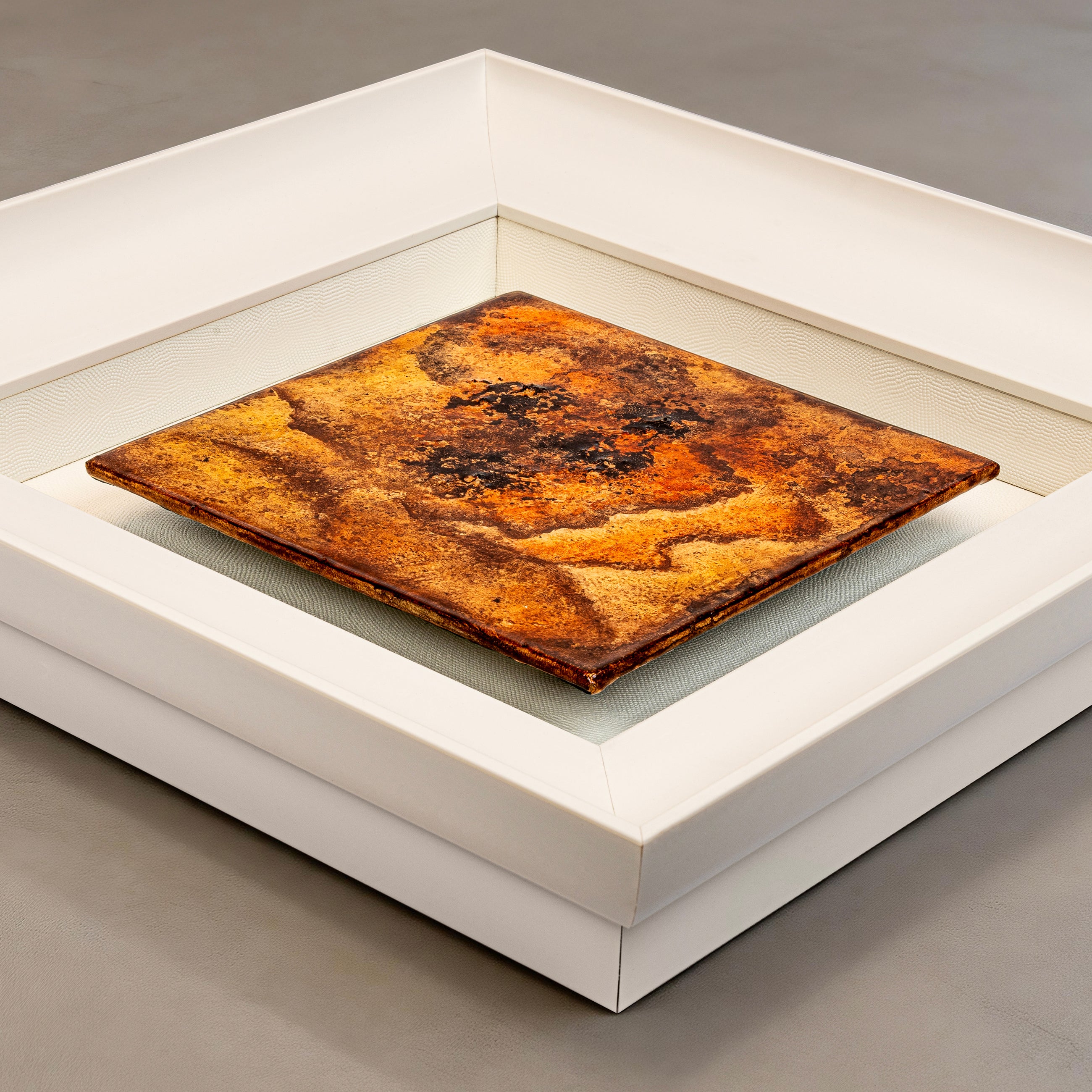 Flat-lay overhead view of Peony — Mineral Paint · Aura Frame, capturing the full expanse of its 3D fire element mineral terrain — petals pressed outward from a central point in successive dimensional passes, the gradient of flame and flower spreading across the entire textured surface.
