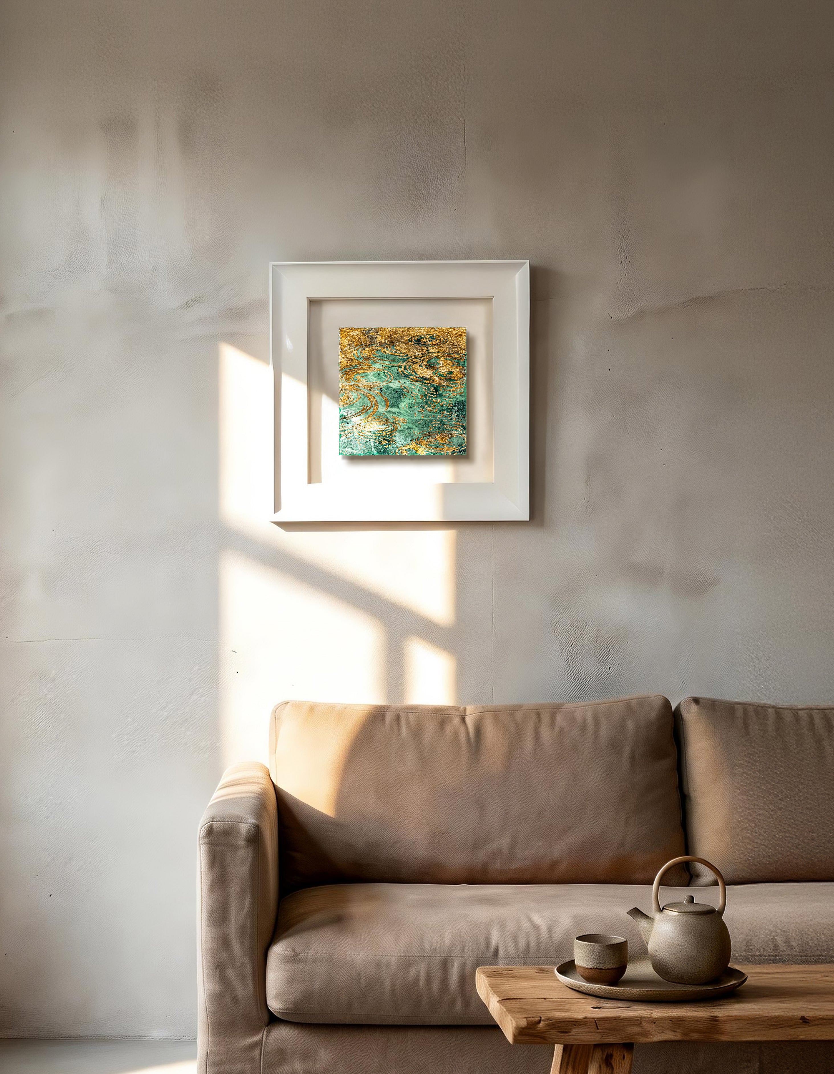Still Water, Deep Current — Patinated Foil · Aura Frame — lifestyle scene of patinated foil art displayed in a serene interior, evoking water element stillness with subtle ripple movement across the framed canvas.