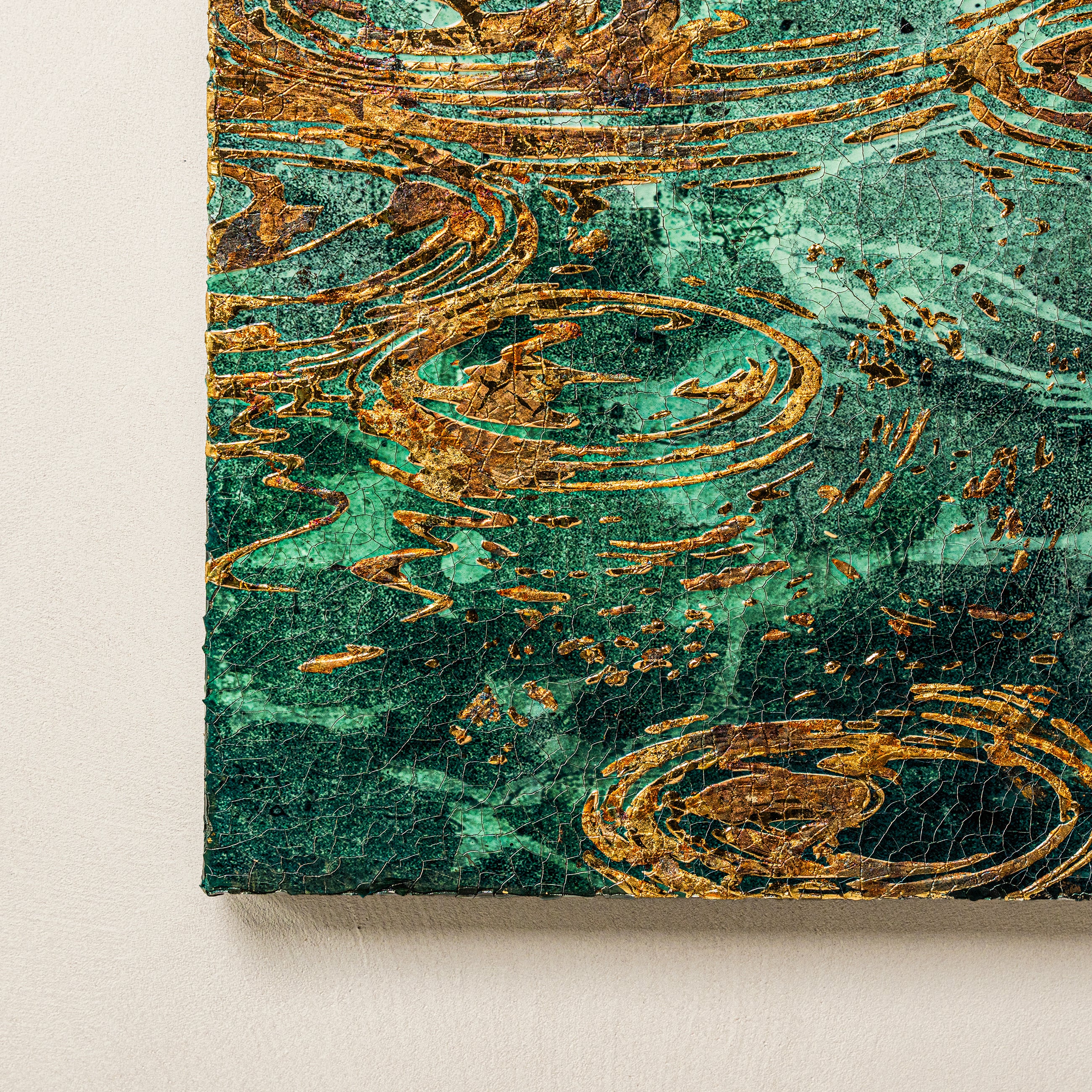 Bottom-left quarter texture detail — handcrafted foil finish.
