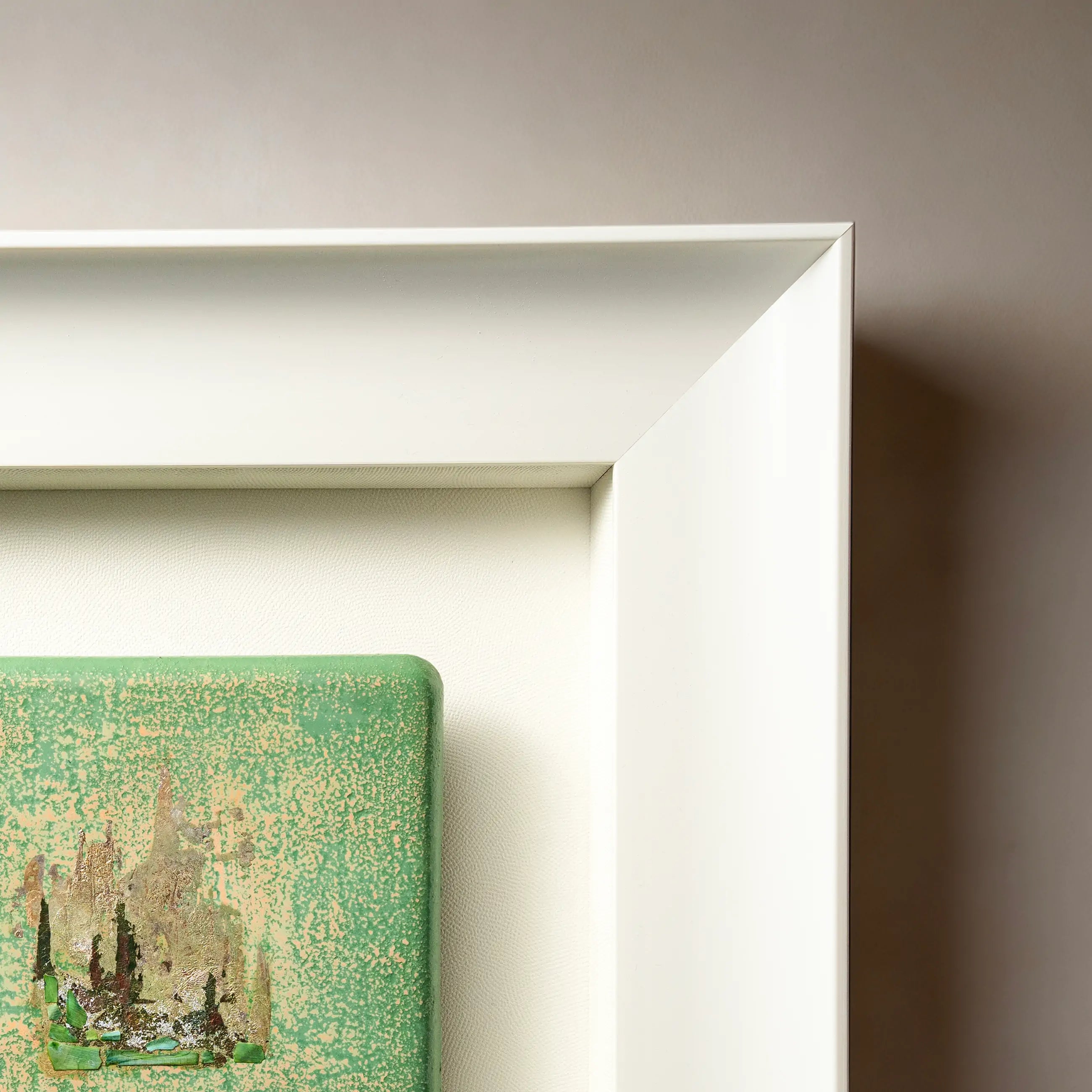 Corner detail of Windward — Patinated Foil · Aura Frame, showing the intricate wood element lacquer texture built through repeated hand-coating, drying, and sanding, with abalone shell iridescence and fired copper tones emerging from the layered surface.