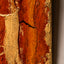 Gilded Terrain — close-up detail highlighting the handcrafted gilded terrain technique, where each sculpted earth element layer builds the artwork's signature three-dimensional texture.