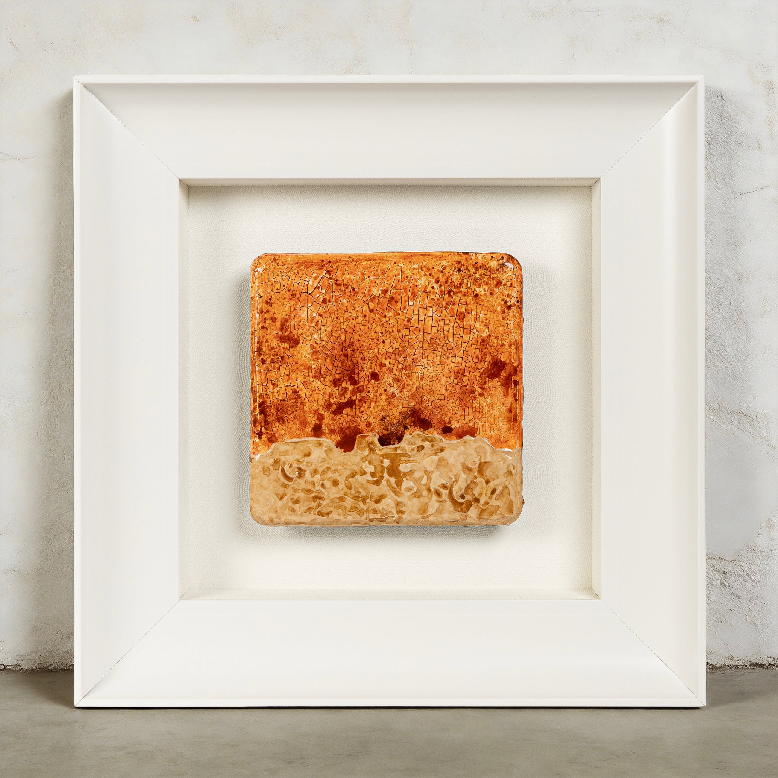 Igneous — Mineral Texture · Aura Frame, full view of a fire element wall art where six or more hand-painted passes of warm brown, ochre, and amber mineral pigment bleed and migrate across a crackle-textured surface, evoking lava flow solidified into sandstone relief.
