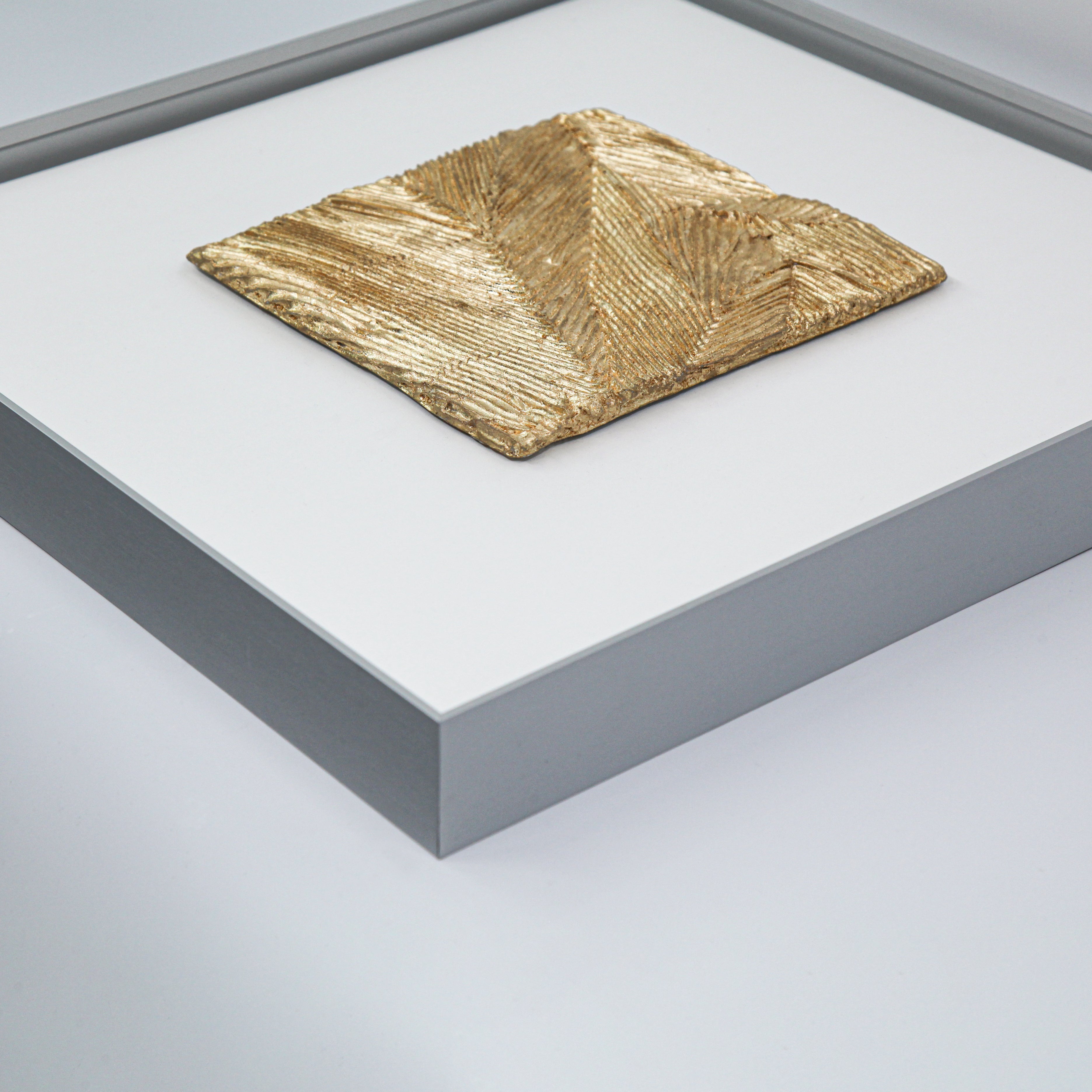 Flat-lay overhead view of Meridian — Gilded Foil · Aura Frame, capturing the full topographic expanse of its metal element mineral terrain — a branching network of gold-filled vein channels reading as ore in cross-section across the entire handcrafted surface.